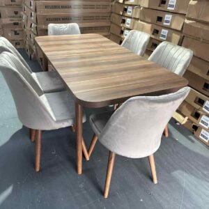 brown wooden dining table with 6 cream chair.jpg