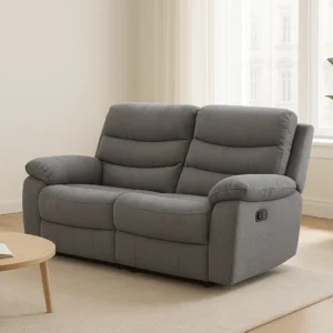 sorento 2 seater sofa inside light room with cream walls with plant behind sofa.webp