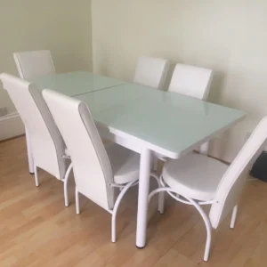 extendable white dining table and chairs set.webp